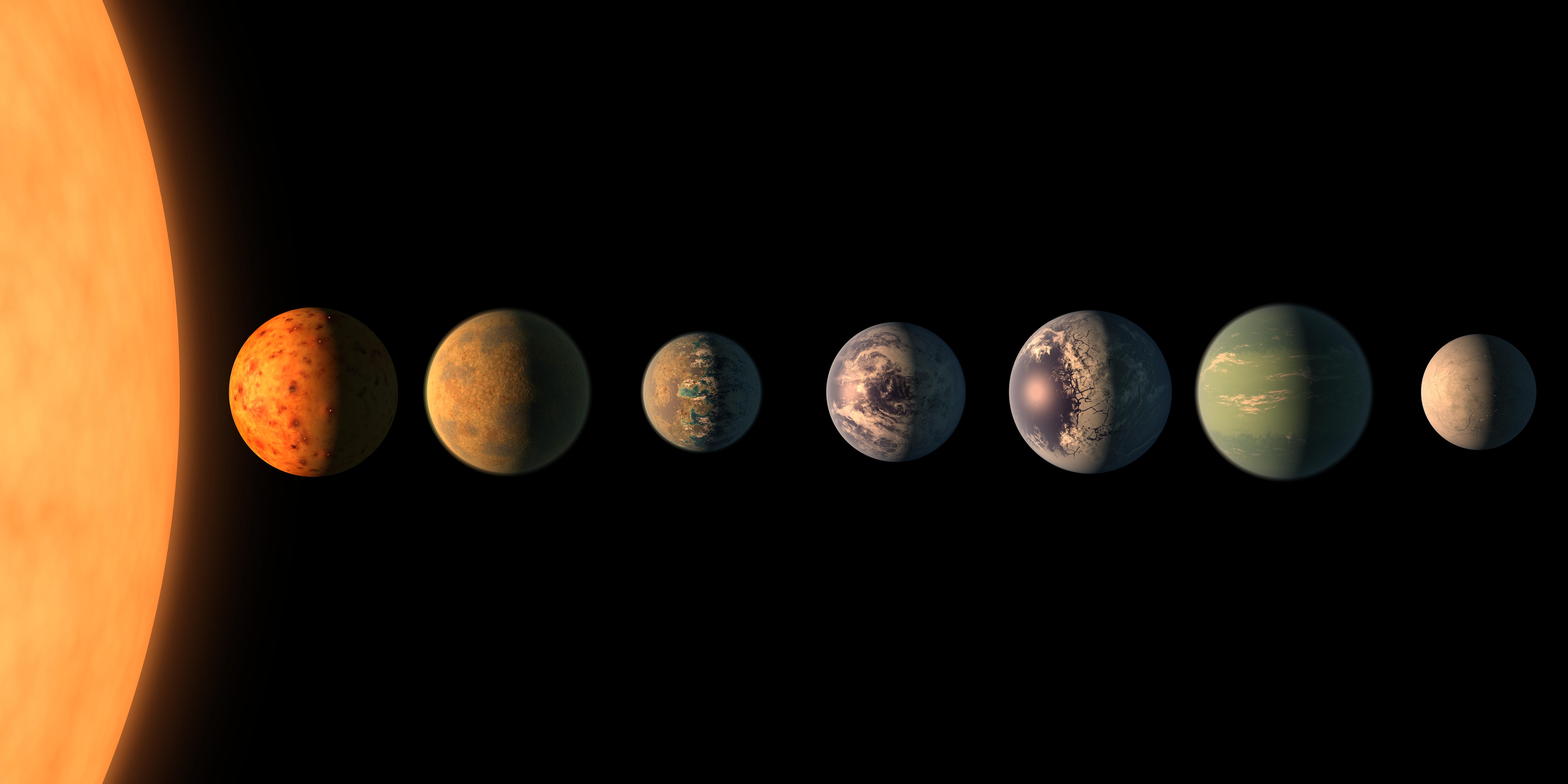 Artist's impression of exoplanets and star